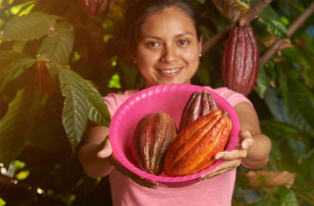 Woman Offering Cacao Pods